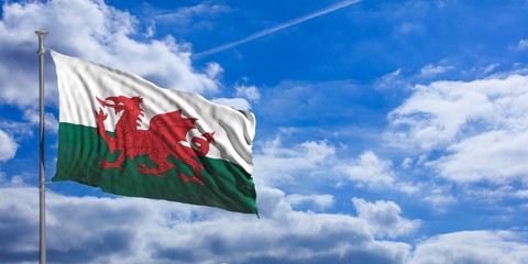 Wales waving flag on blue sky. 3d illustration