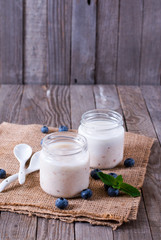 Fresh yogurt in a glass jar