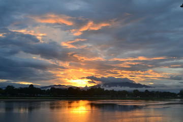 Sunset after rainy day at Rattanakosin Memorial Bridge at Tak, Thailand 