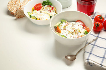 Tasty breakfast with yogurt on white background