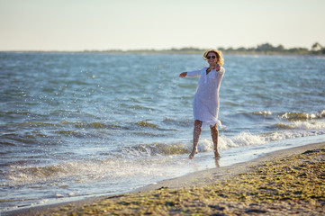 Young woman having fun on beach