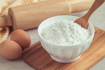 Flour in bowl and eggs