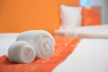 Towel Origami prepared on a bed