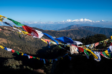 Tibetan prayer flag or Lung ta and Kangchenjunga high mountain range view