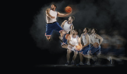 basketball player jumping with ball on black bakground. collage