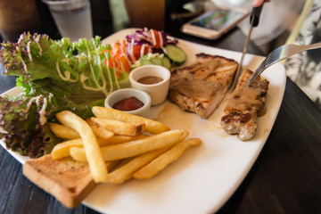 Grilled pork steak with vegetables