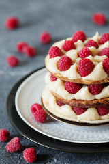 Millefeuille with vanilla cream and raspberry