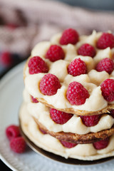 Millefeuille with vanilla cream and raspberry