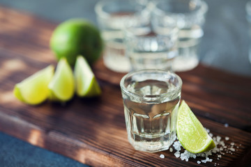 Tequila silver with lime and sea salt decorated with blackberry and mint