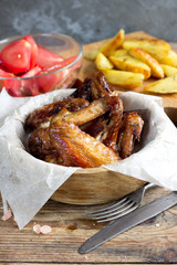 Teriyaki chicken wings with potatoes
