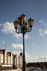 Fototapeta na wymiar vintage street lantern on blue sky background