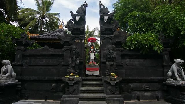 Statues at the entrance of a hinduist temple in Bali, Indonesia. Zoom in.