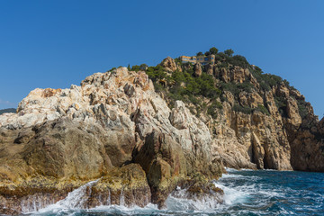View from the sea on a beautiful rocky landscape on a sunny day