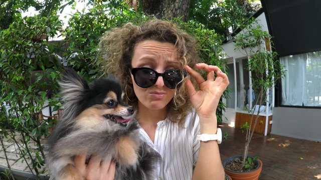 Funny Stupid Woman With Duckface Holding Cute Dog. HD, 1920x1080. 