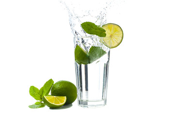 Splash in a glass with a mint and lime cocktail