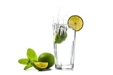 Splash in a glass with a mint and lime cocktail