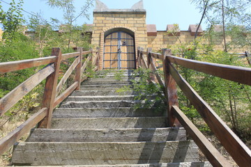 Wooden staircase leading to the castle