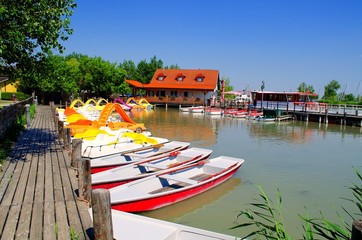Fototapeta na wymiar Picturesque port of rental boats in Illmitz, Neusiedl lake, Austria.