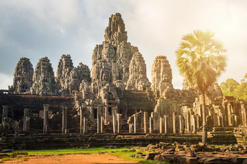 Fototapeta na wymiar Bayon temple a mountain temple built to represent Mount Meru, the center of the universe in Hindu and Buddhist cosmology, Siem Reap of Cambodia.