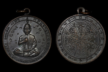 Amulet Coin, The most famous and the best amulet`s from Laos. © kamanit