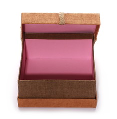 open and empty golden gift box with string ribbon bow isolated on white background
