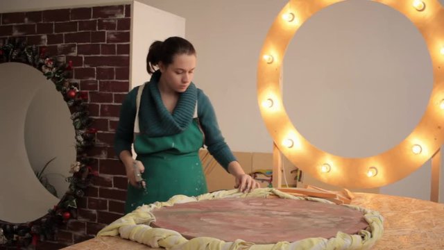 Girl creating decorative item