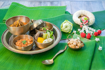 Northern Thai food with banana leaf background