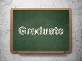 Education concept: Graduate on chalkboard background