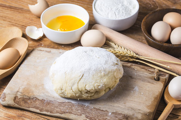 Dough preparation recipe bread, pizza or pie making ingridients, food flat lay on kitchen table background.