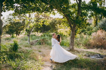 Beautiful wedding couple on a walk in the valley