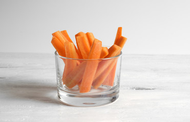 Carrot sticks in a glass