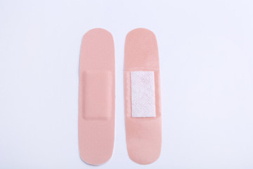 Medical plasters on a white background