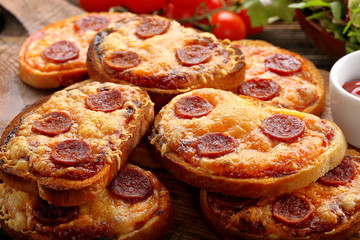 Fresh toast with melted cheese and chorizo sausage