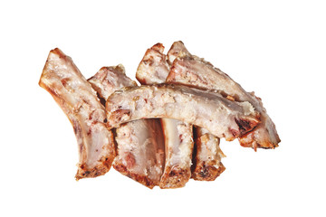 Heap of picked pork ribs bones isolated on white.Poverty concept