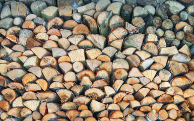 A woodpile of firewood, beautifully pinned and laid.