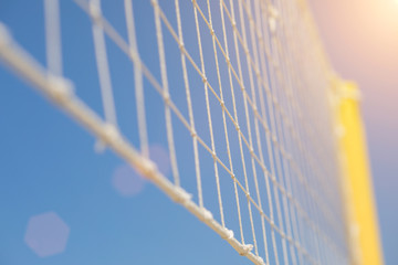 Tennis or volleyball net against blue sky background