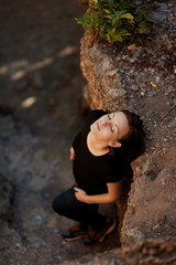 Beautiful brunette girl on a walk outdoors