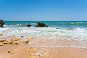 A view of a marvelous sandy beach portugal . Summer time