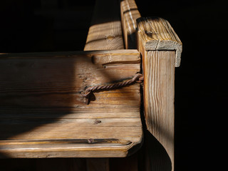 Sunlit Wooden Detail: A Glimpse of the Past