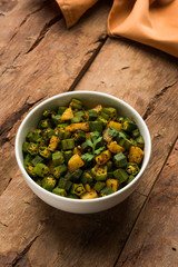 Indian masala fried bhindi or bhendi or Okra or ladyfinger curry or sabji, selective focus © StockImageFactory