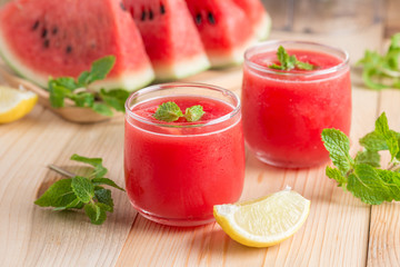 Watermelon juice with watermelon sliced, lemon.
