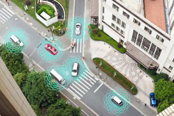 Smart car (HUD) , Autonomous self-driving mode vehicle on metro city road iot concept with graphic sensor radar signal system and internet sensor connect. Above view.
