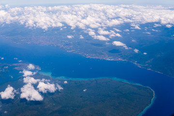 Indonesia tropical paradise crystal water turquoise aerial view from plane