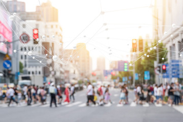 Internet of things , iot , smart city , big data technology concept. Neural networks connect atoms and blur city people cross street background. Flare light effect , 3d Rendering.