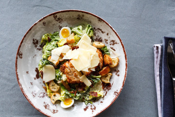 Caesar salad in a round plate