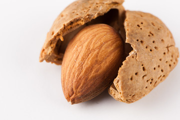 Whole almonds nuts isolated on white background