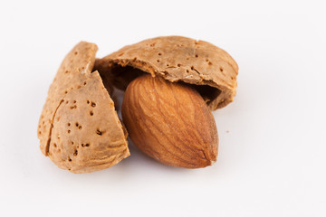 Whole almonds nuts isolated on white background
