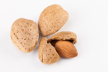 Whole almonds nuts isolated on white background