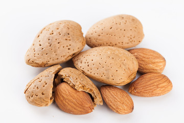 Whole almonds nuts isolated on white background