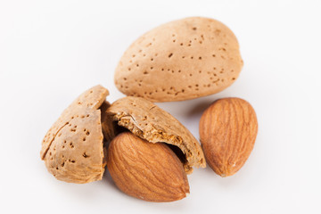 Whole almonds nuts isolated on white background